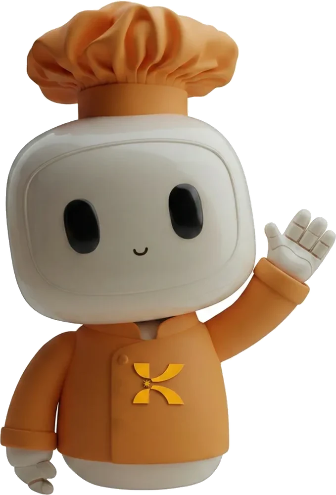 Chef Buddy, the thatKorner concierge: a white rounded character in an orange chef's hat and jacket with the K mark on its chest